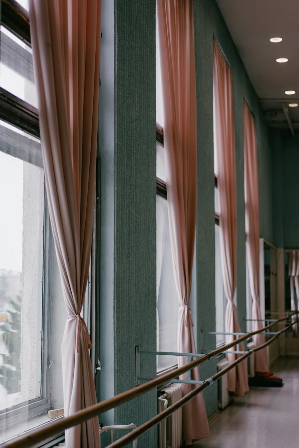 Ballet studio with barre and curtains